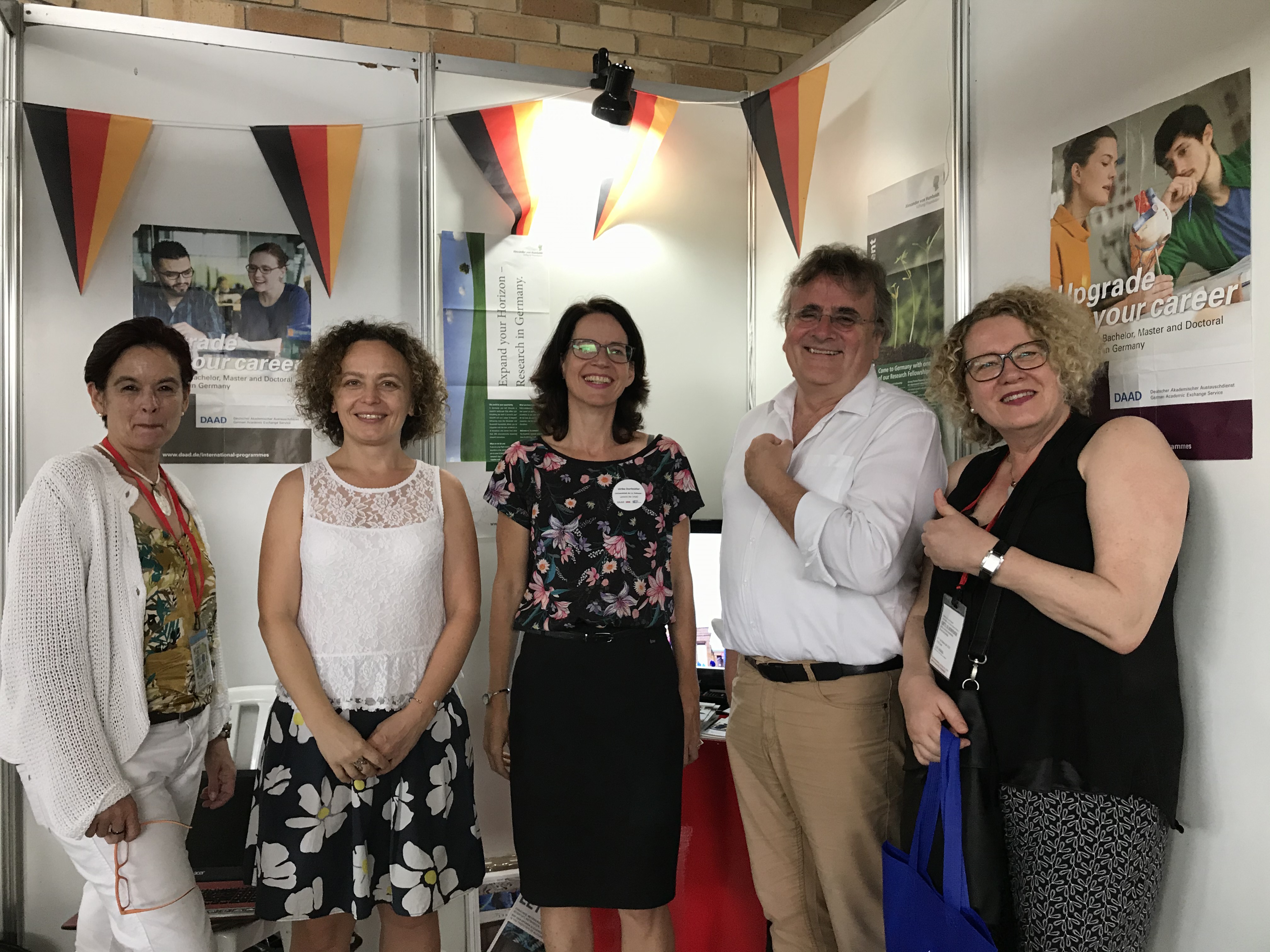 At the German institutions' booth: Prof. Dr. Susanne Hilland (University of Heilbronn), Dr. Kathrin Winkler (DFG Latin America), Dr. Ulrike Dorfmüller (DAAD Cuba), Andreas Trepte (MPG Buenos Aires) and Christine Arndt (DAAD)