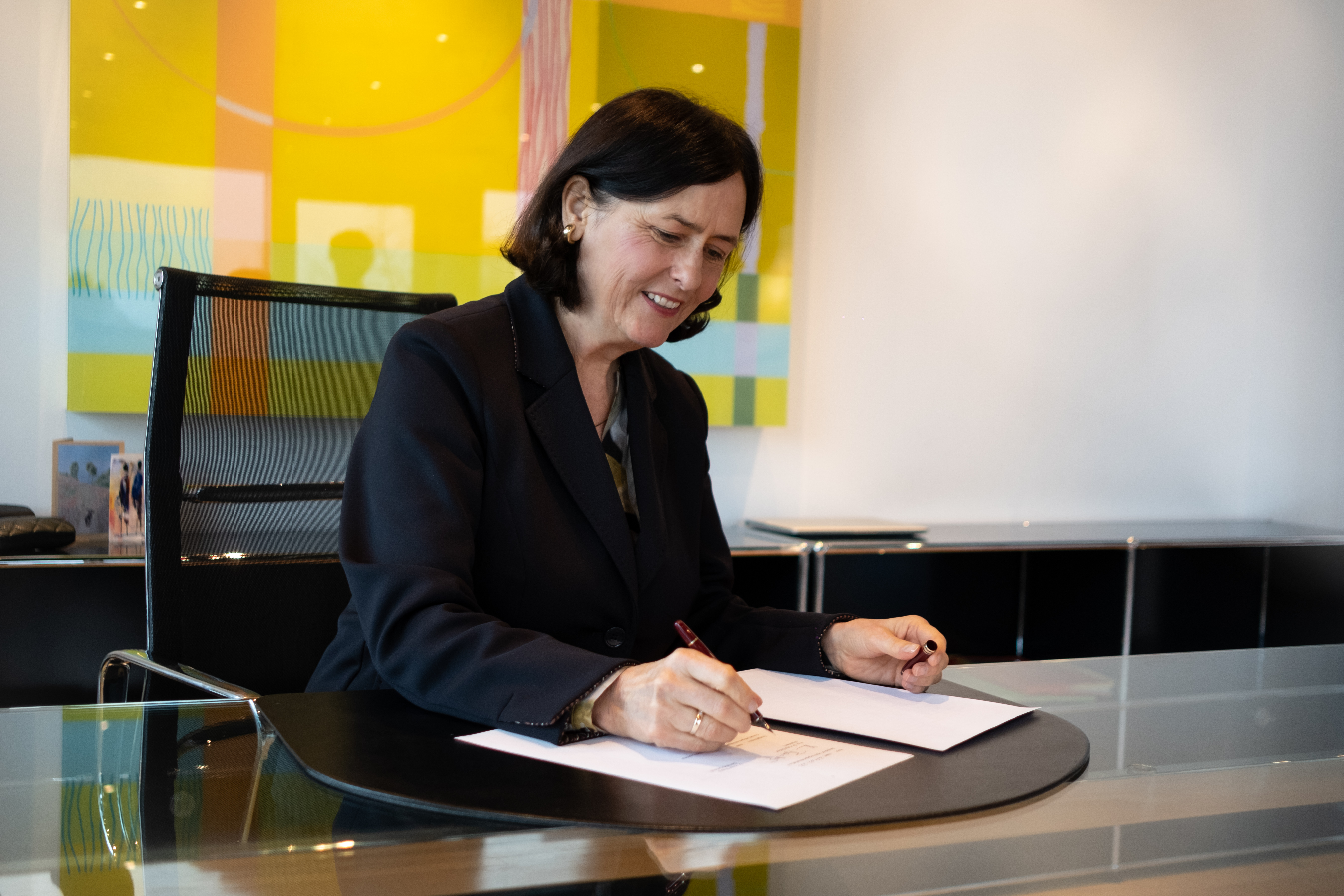 Prof. Katja Becker signing the MoU