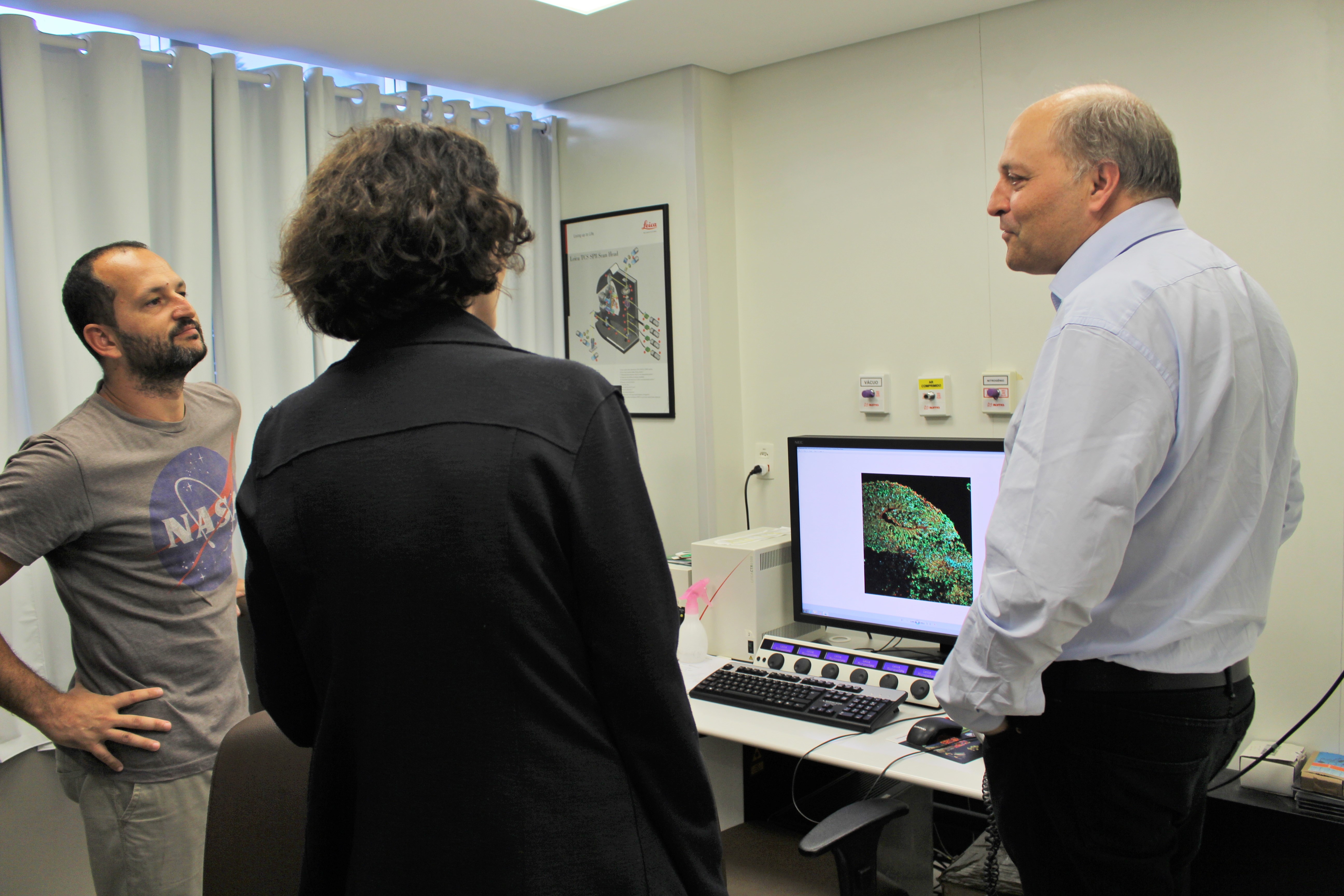 Researchers at IDOR gave Brecht (right) a tour of their research labs
