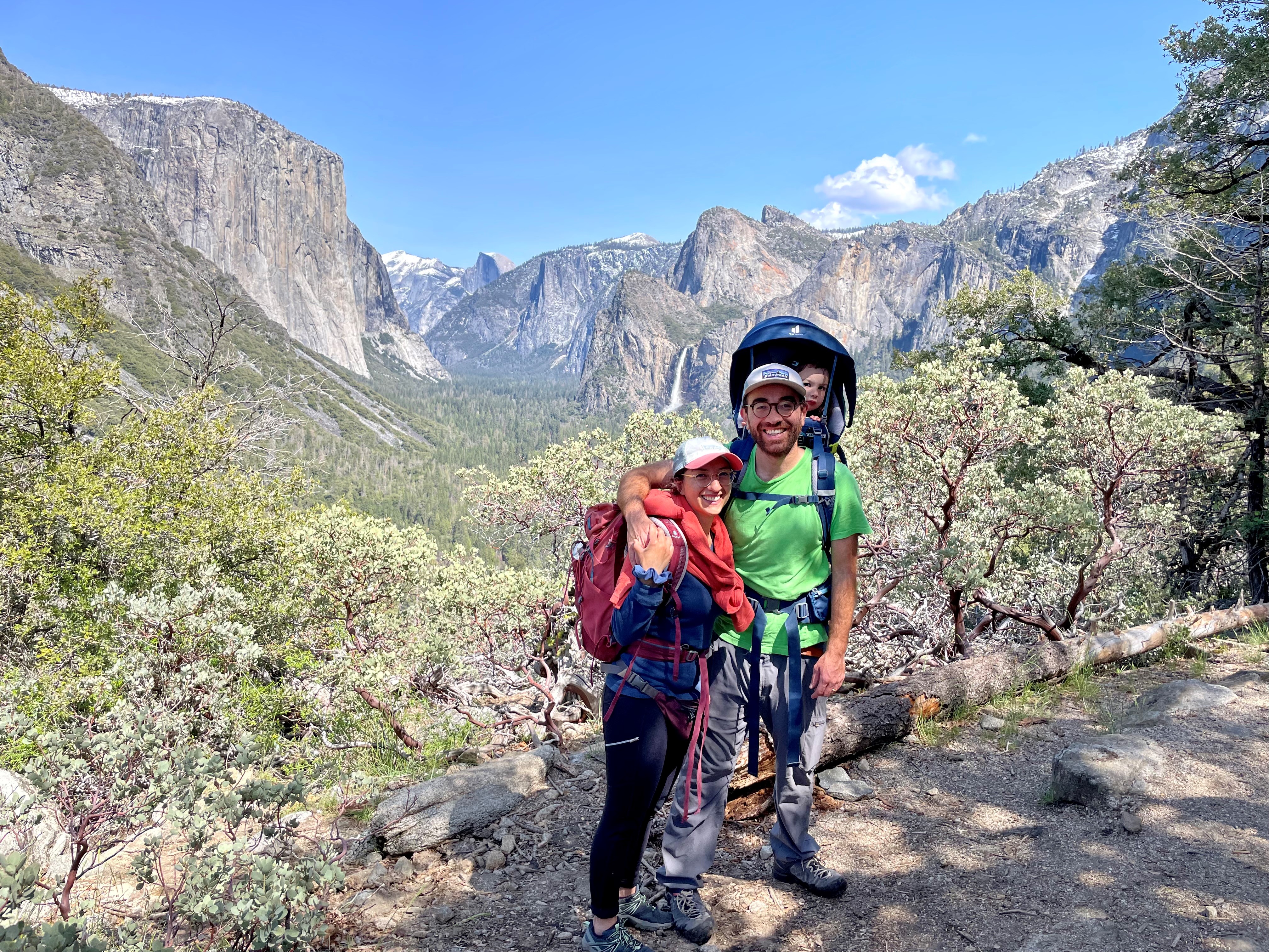 On an excursion to Yosemite National Park with a view of El Capitan and the Half Dome (with “the commander” in the carrier backpack