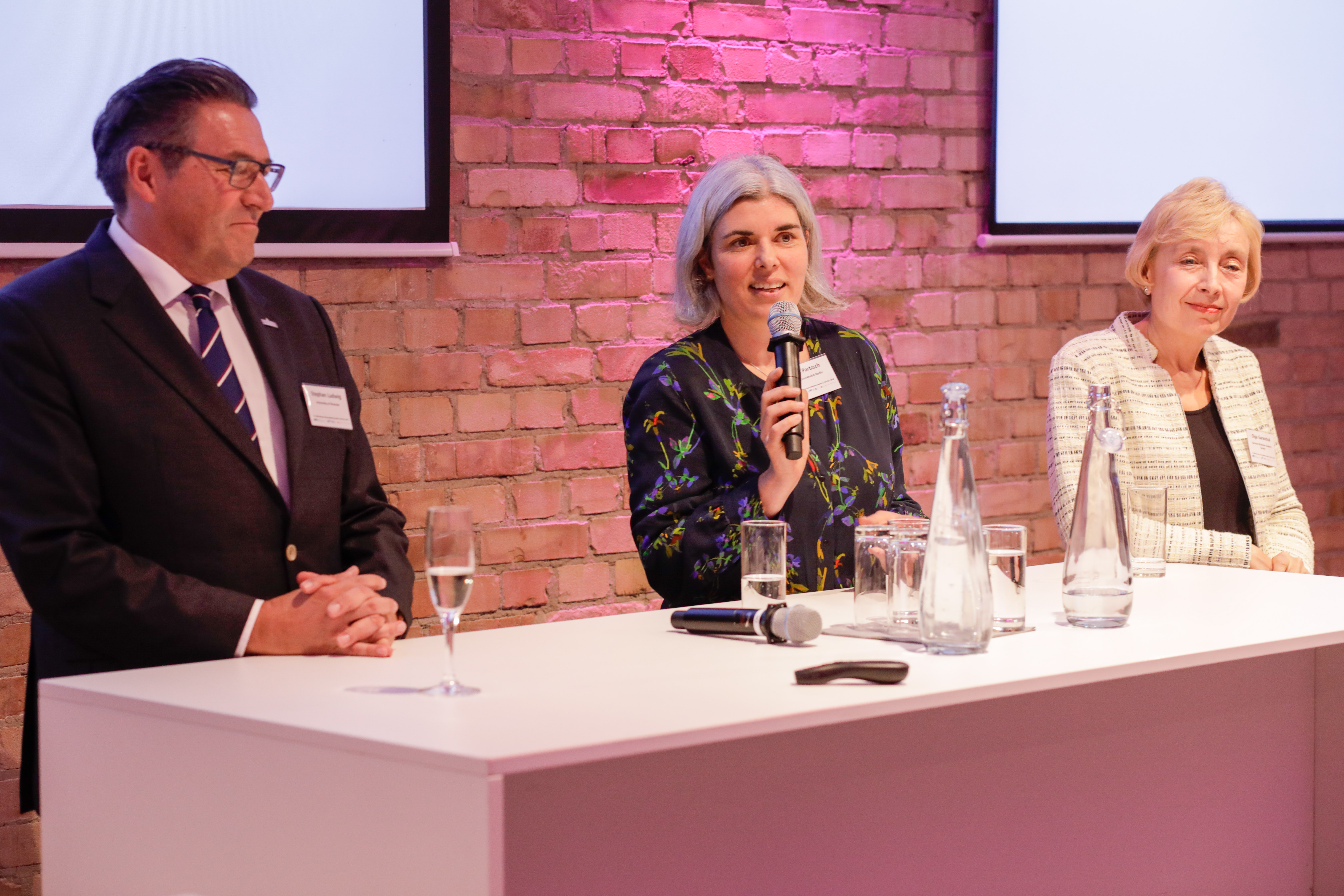 Scholarly panel discussion with Lena Partzsch, Stephan Ludwig and Olga Garaschuk at Spreespeicher