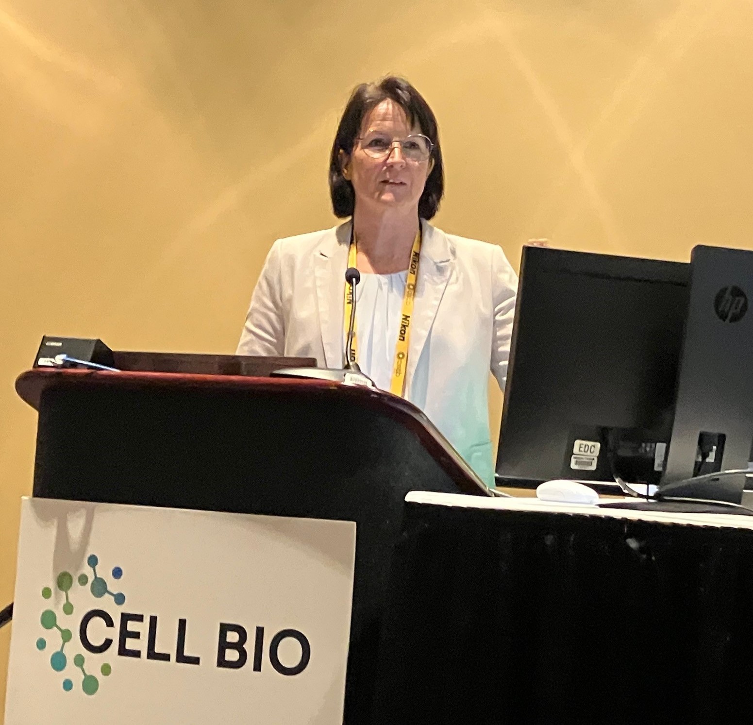 portrait picture of the speaker Britta Mädge, a DFG Program Director, speaking at the information session “Cell Biology in Germany: An Introduction to Three German Research Hubs”