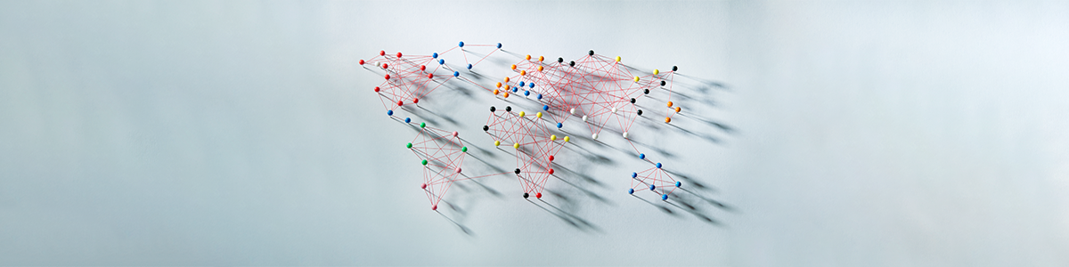 Picture of a world map as connected pins